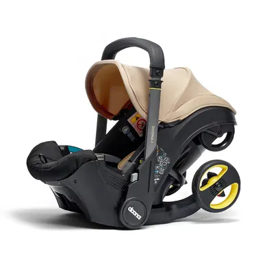 Babyschalen 0-13 kg, Gruppe 0+, doona, Beige – Besonderheit: i-Size Autokindersitz Gruppe 0+ für Babys ab Geburt bis 15 Monate (13 kg)
